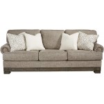 Signature Design by Ashley Einsgrove New Traditional Upholstered Sofa with Nailhead Trim Brown